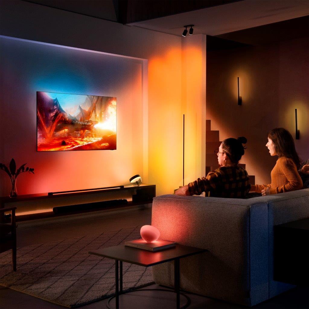 https://essentialinstall.com/wp-content/uploads/2023/01/Philips-Hue-Sync-TV-app-lifestyle.jpg